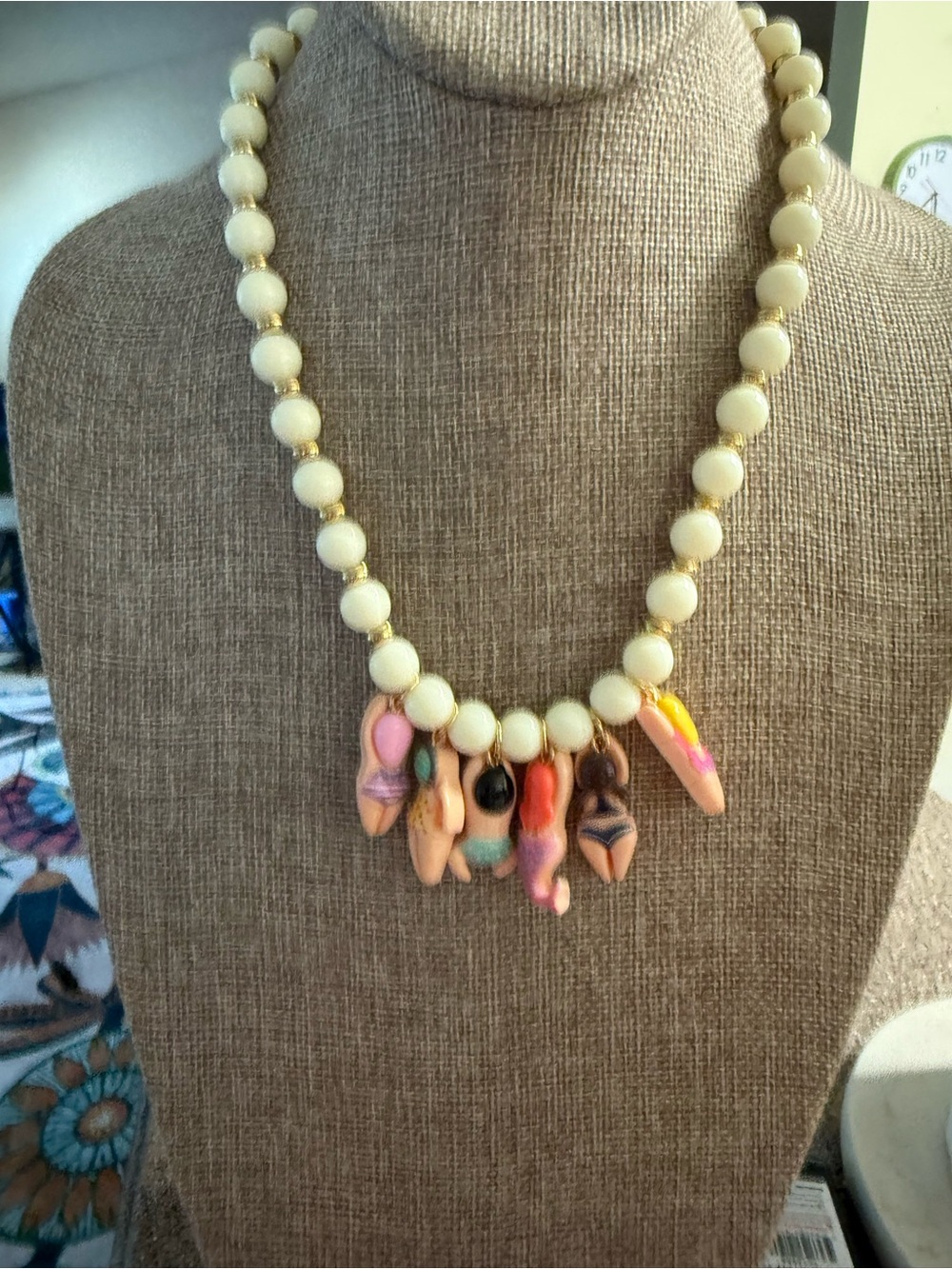White Beaded Necklace with Gold Accents and Multicolor Swimmer Charms - Picture 10 of 10